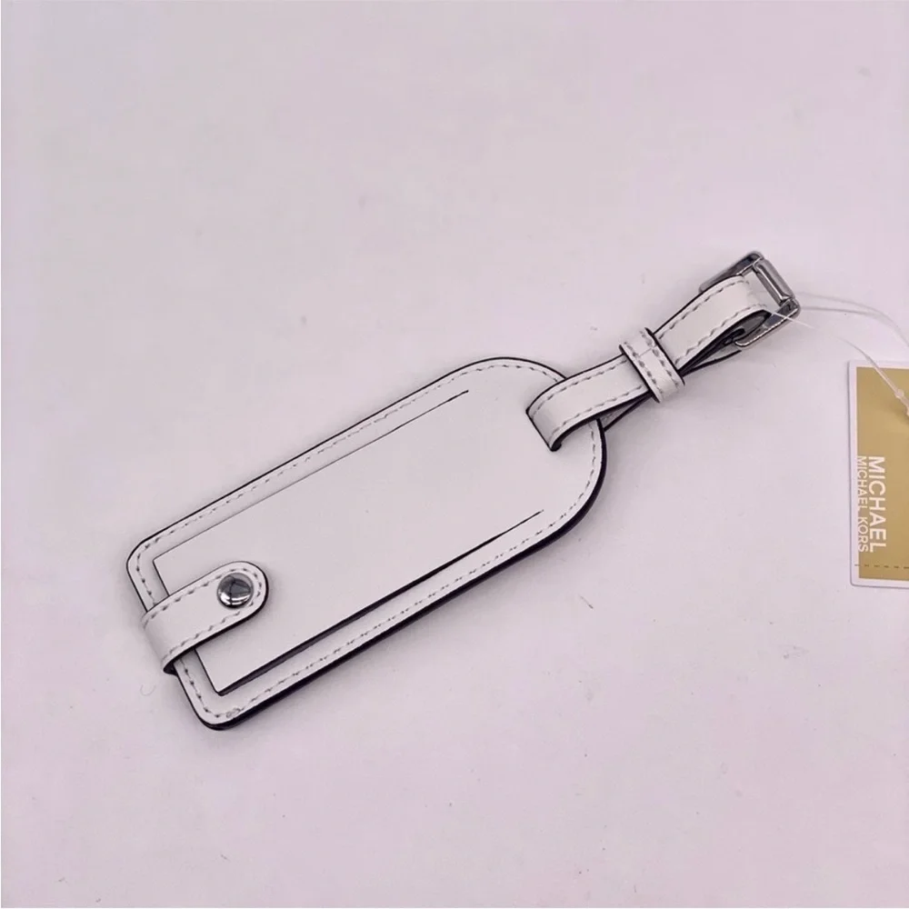 Michael Kors White and Pink Luggage Tag